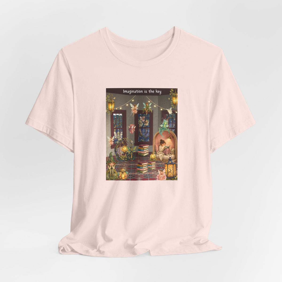 T-Shirt — Cozy Nighttime Reading Scene "Imagination is the Key"