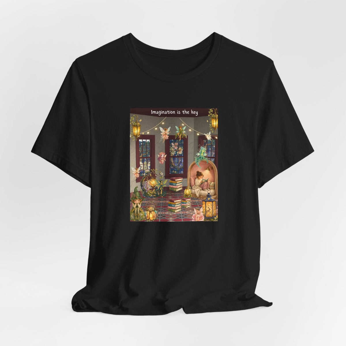 T-Shirt — Cozy Nighttime Reading Scene "Imagination is the Key"