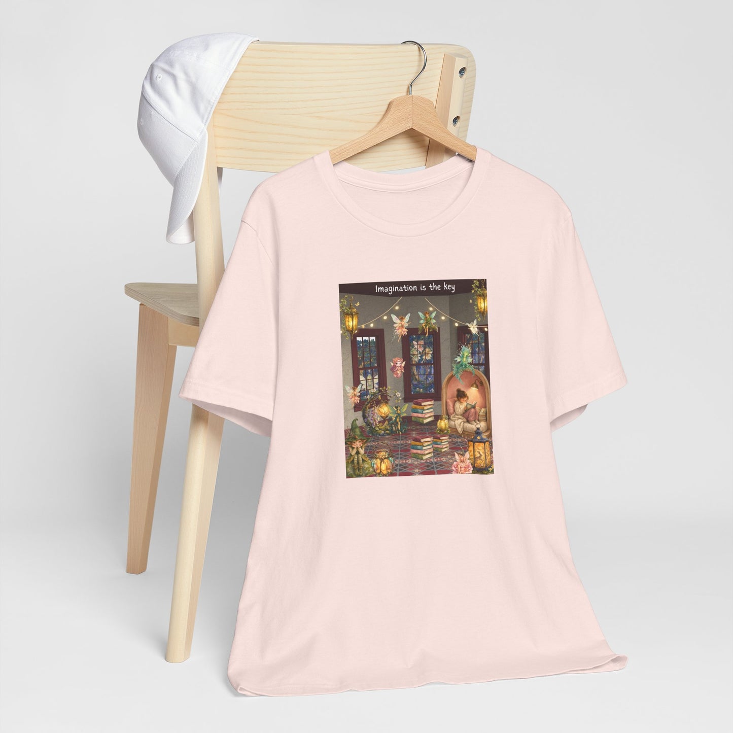 T-Shirt — Cozy Nighttime Reading Scene "Imagination is the Key"