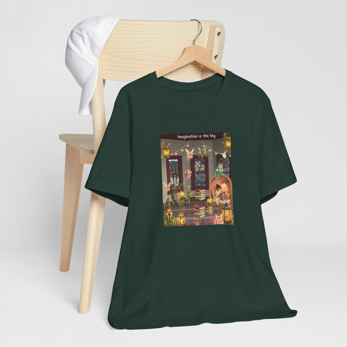 T-Shirt — Cozy Nighttime Reading Scene "Imagination is the Key"