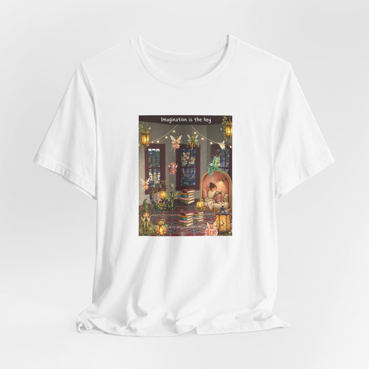 T-Shirt — Cozy Nighttime Reading Scene "Imagination is the Key"